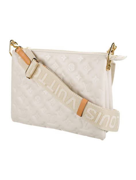 white louis vuitton coussin bag